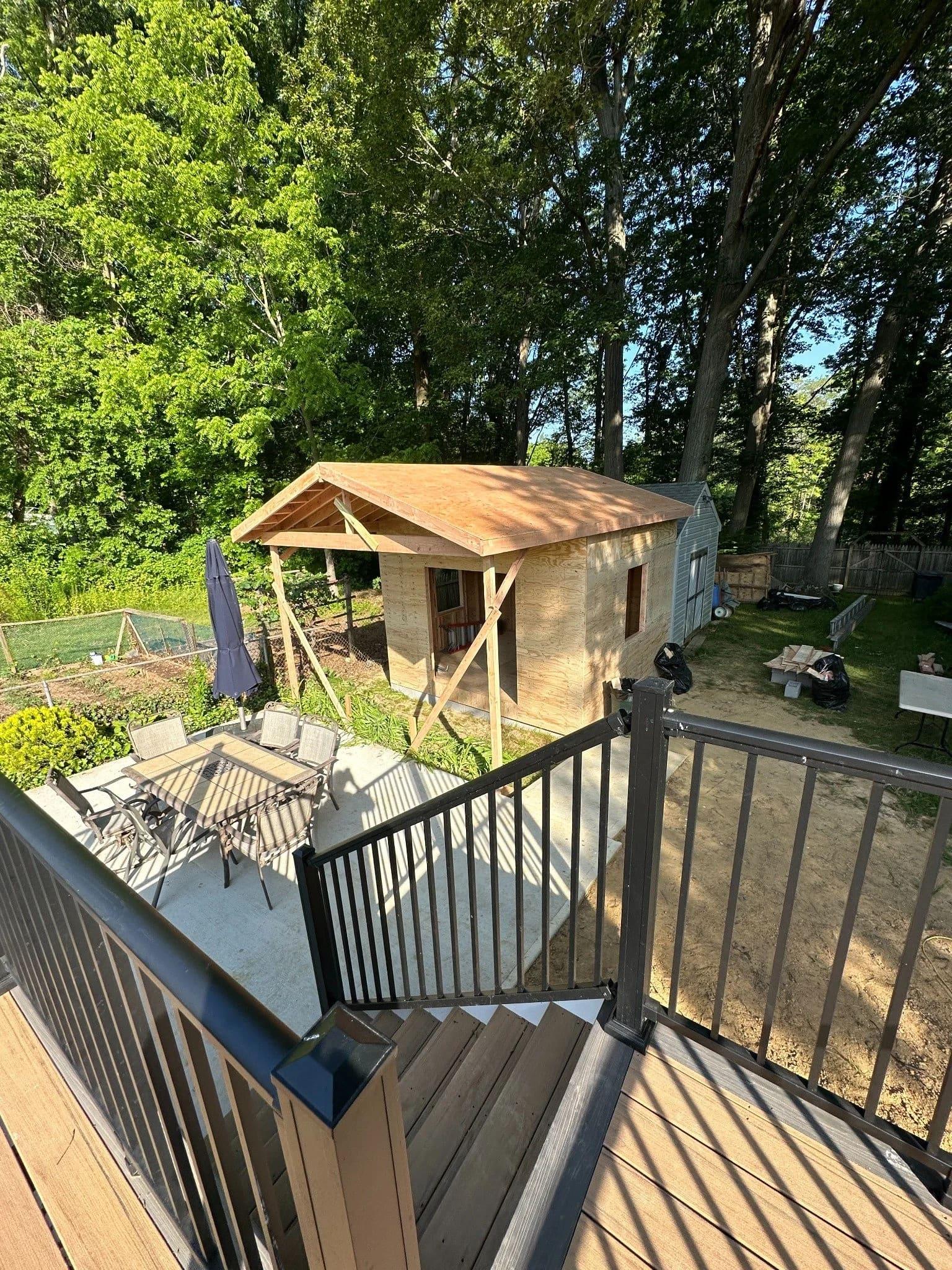 Mascolino Property Solutions crew framing a custom outdoor structure in Monmouth County NJ